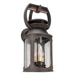 Old Trail Outdoor Wall Sconce - Centennial Rust / Clear Seeded