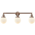 Beacon Bathroom Vanity Light - Antique Copper / Matte White