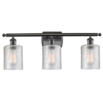 Cobbleskill Bathroom Vanity Light - Oil Rubbed Bronze / Clear Ripple