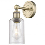 Clymer Wall Sconce - Antique Brass / Clear Seedy
