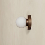 Orb Outdoor Surface Mount - Patina Brass / White Glass