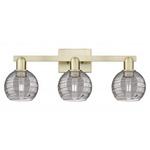 Athens Deco Swirl Bathroom Vanity Light - Antique Brass / Light Smoke