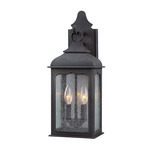 Henry Street Outdoor Wall Sconce - Colonial Iron / Clear Seeded