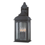 Henry Street Outdoor Wall Sconce - Colonial Iron / Clear Seeded