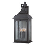 Henry Street Outdoor Wall Sconce - Colonial Iron / Clear Seeded