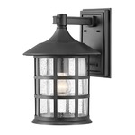 Freeport 120V Composite Outdoor Wall Sconce - Textured Black / Clear Seedy